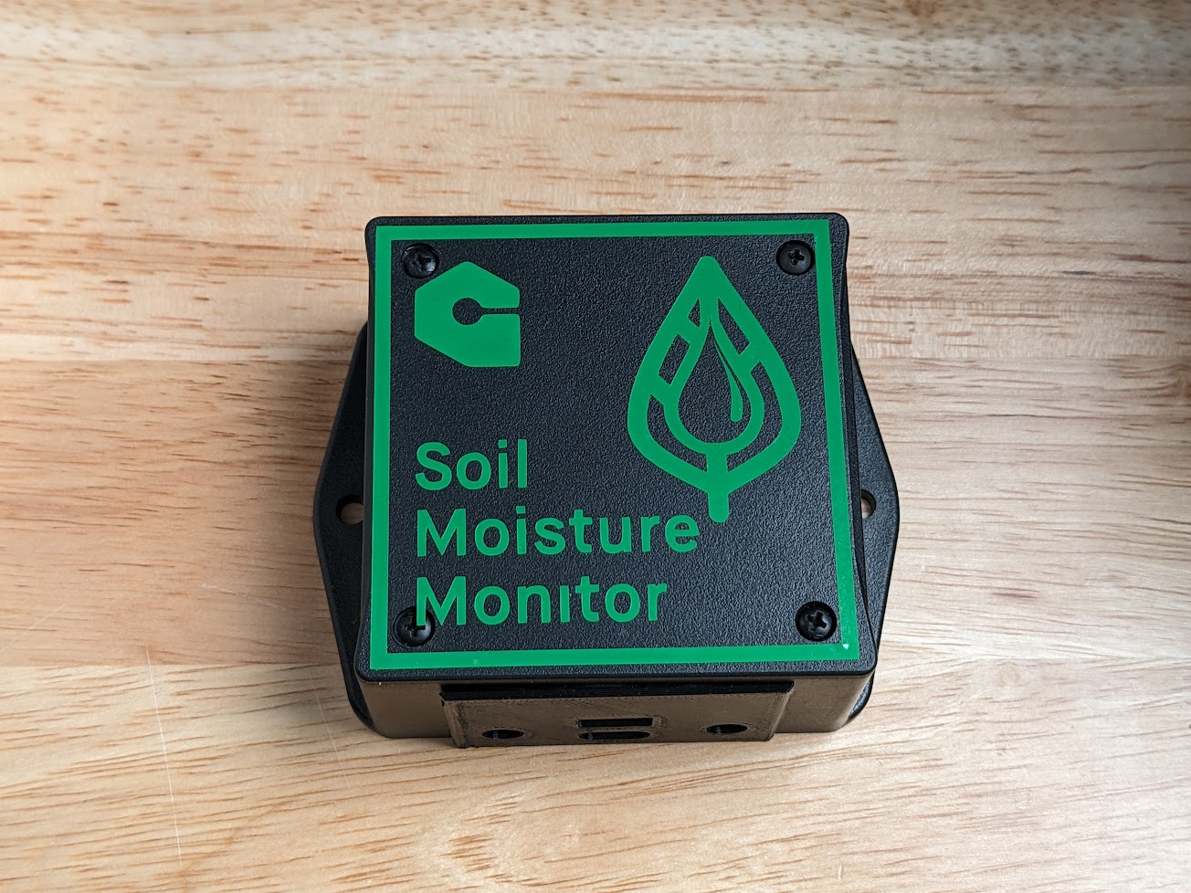 Soil Moisture Monitor case closed lid with sticker